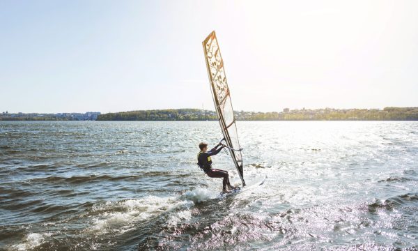 young-man-with-kitesurf-board
